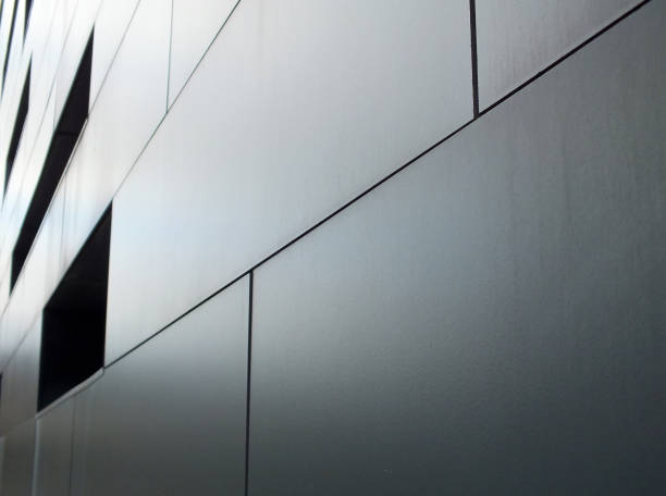 istock stainless steel metallic cladding on modern industrial building 1016623860