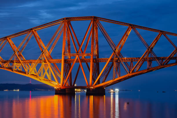 istock Evening view Forth Bridge over Firth of Forth in Scotland 1016647988