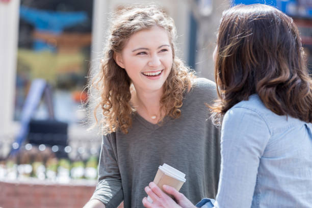 istock Young woman enjoys visiting with friend 1016655274