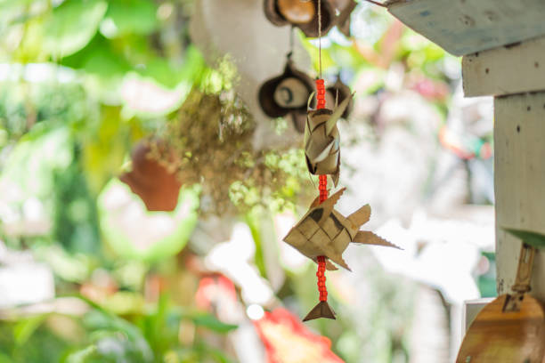 istock Decorative Fish hangig in the Garden 1016658048