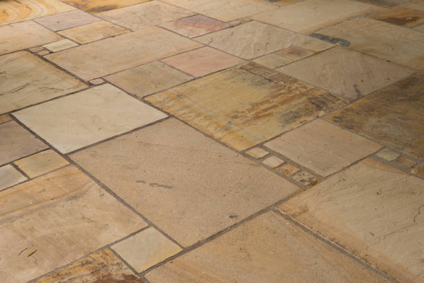 istock Lime-sandstone slabs laid irregularly on the terrace 1016659054