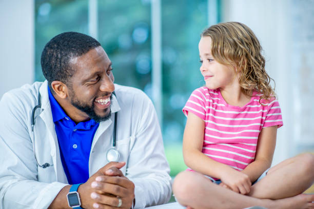 istock Girl With Doctor 1016659198