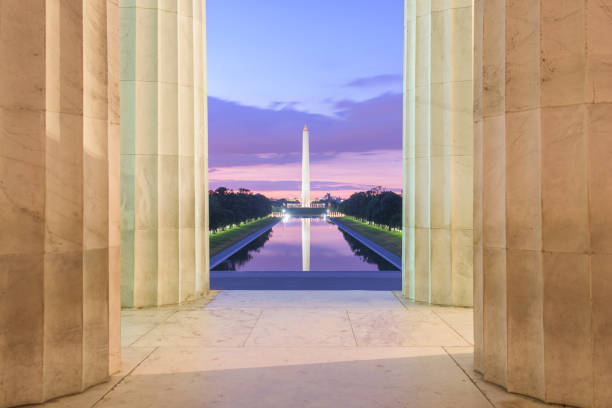 Washington DC, USA Washington Monument on the Reflecting Pool in Washington, D.C. at dawn. washington monument reflecting pool stock pictures, royalty-free photos & images