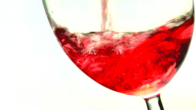 wine poring in slow motion