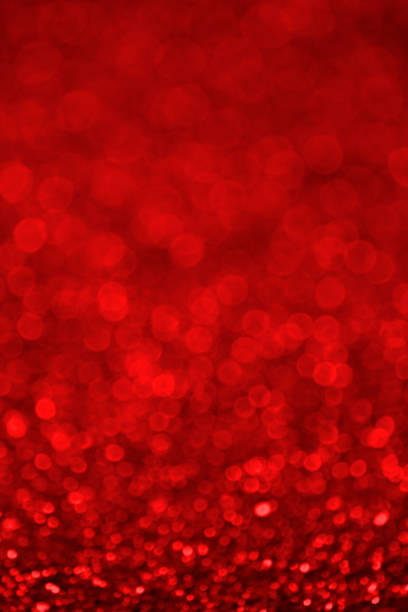 istock Red Abstract Defocused Christmas Lights Background 1016667556
