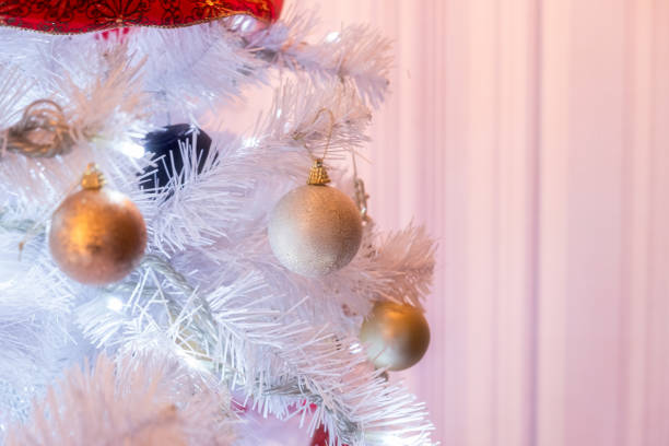 istock White Christmas tree illumination with ball glitter decoration 1016673022