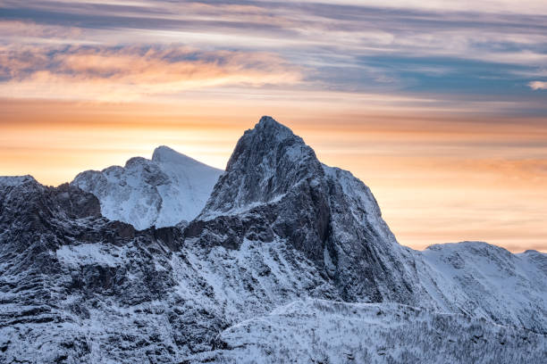 istock Snow steep peak with colorful sky 1016673188