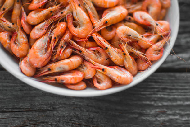 istock on a white plate on wooden background shrimp 1016681186