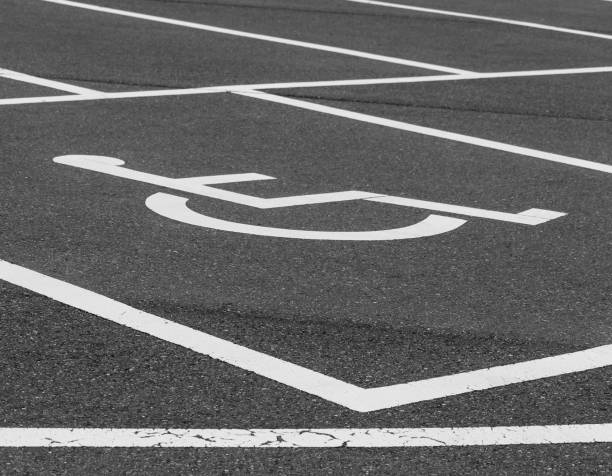 istock Empty parking lot with disabled parking sign at the  car park 1016685260