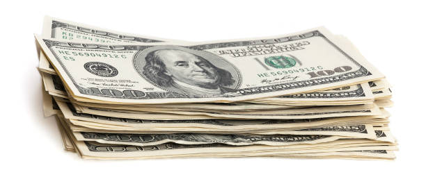 istock A stack of one hundred dollar bills on a white background. Isolated. 1016692686