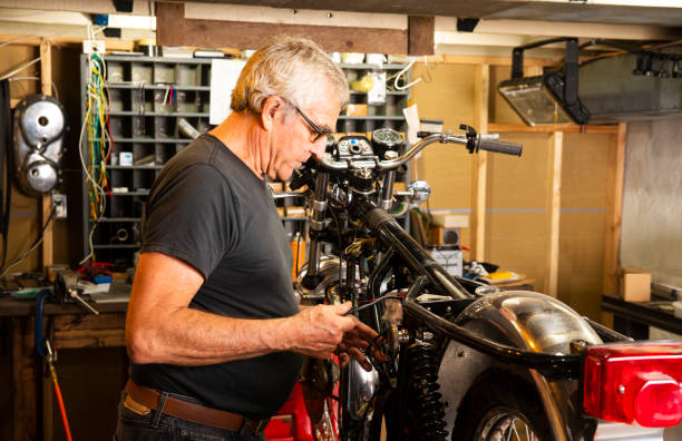 istock A specialist classic motorcycle restorer in his workshop 1016695508