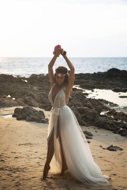 istock Beautiful and sensual bride on the beach 1016697730