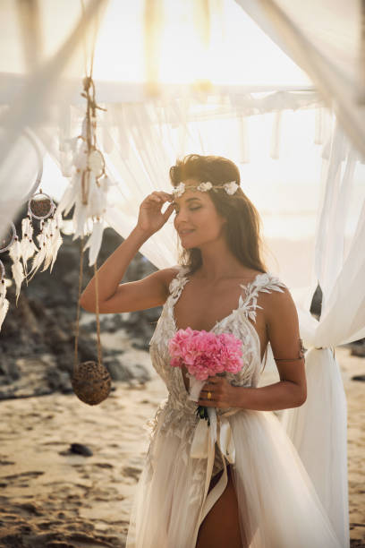 istock Beautiful and sensual bride on the beach 1016697770