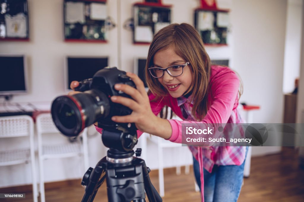 I will be photographer Little girl teaching how to use digital camera Child Stock Photo
