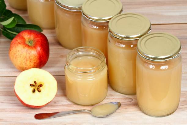 istock Homemade preserved apple puree in jar 1016698838