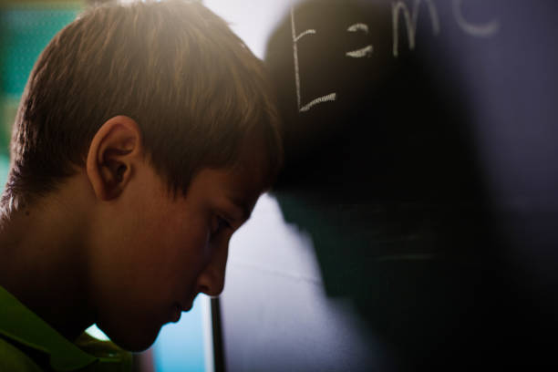 istock Teenager Boy in Classroom 1016706758
