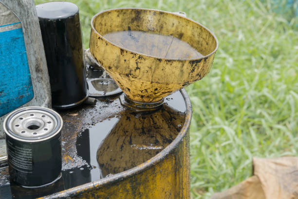 istock Hazardous waste, Used engine oil, dirty container, environment pollution 1016712748