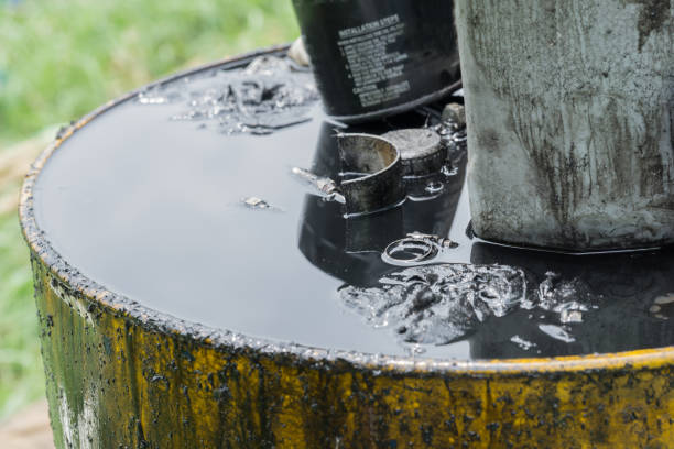 istock Hazardous waste, Used engine oil, dirty container, environment pollution 1016712772