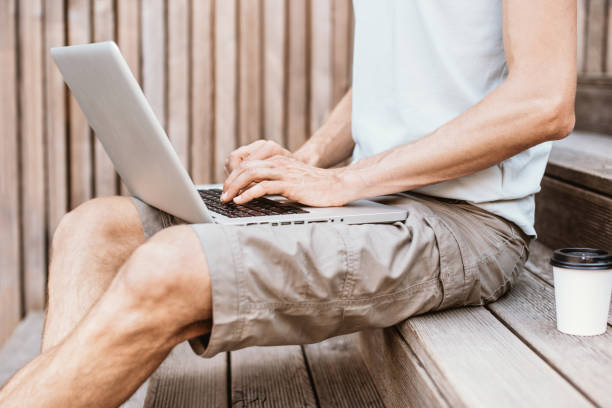 Student, businessman, freelancer or IT professional working on laptop computer