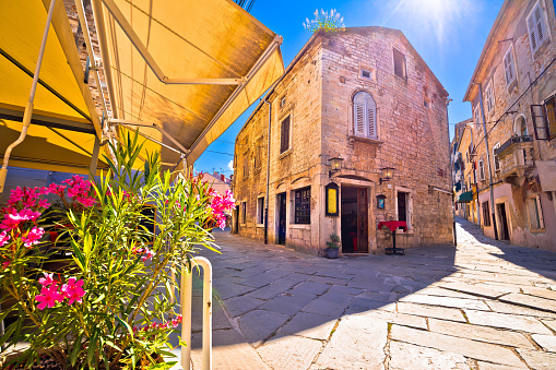 Sunny stone street of ancient Pula view, Istria region of Croatia