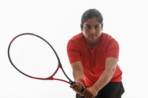 Tennis: Female sportsman in action