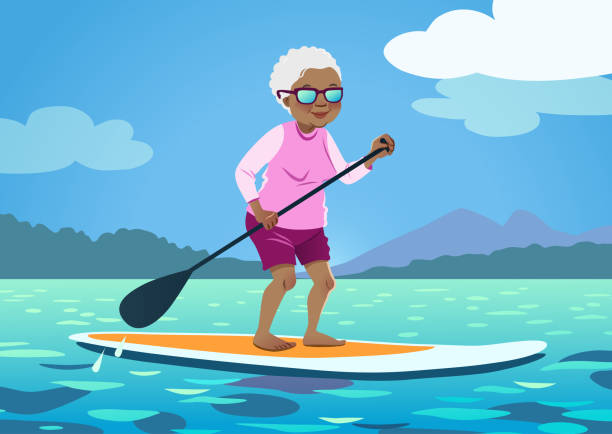 スタンド アップ パドル ボード シニア アフリカ系アメリカ人女性。ラッシュ ガードと穏やかな水と緑と山々 を背景に漕いでショート パンツを着てかわいいおばあちゃん。高齢者のアクテ� - paddleboard oar women lake点のイラスト素材／クリップアート素材／マンガ素材／アイコン素材