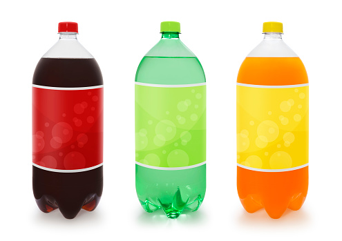 Various soda bottles flavors isolated on white (excluding the shadow)