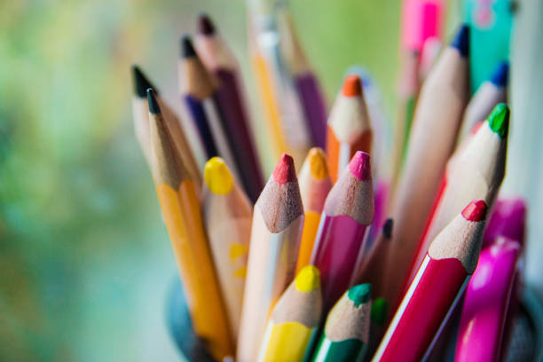 istock various colored pencils in the glass, selective focus 1016737100