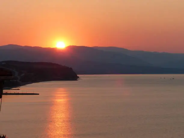 A beautiful sunset off the coast of Nea Roda, Greece