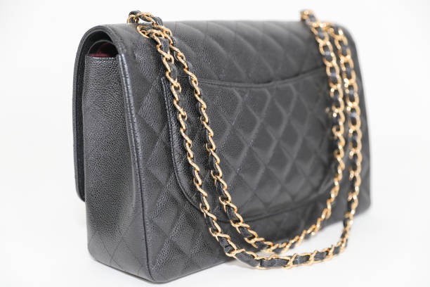 istock Photo of black leather bag  on white background 1016743604