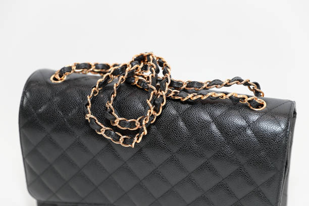 istock Photo of black leather bag  on white background 1016743664