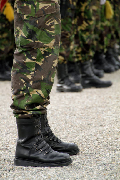 istock Soldiers standing in a row during military parade 1016756072