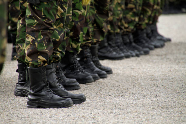 istock Soldiers standing in a row during military parade 1016758160