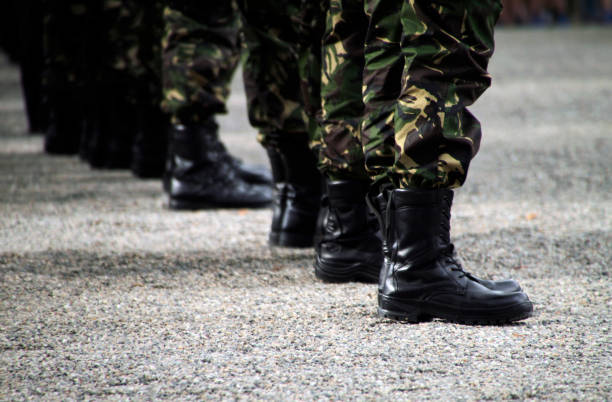 istock Soldiers standing in a row during military parade 1016758354