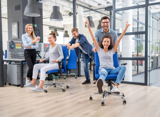 istock Young people having fun in the office. Happy team. 1016764566