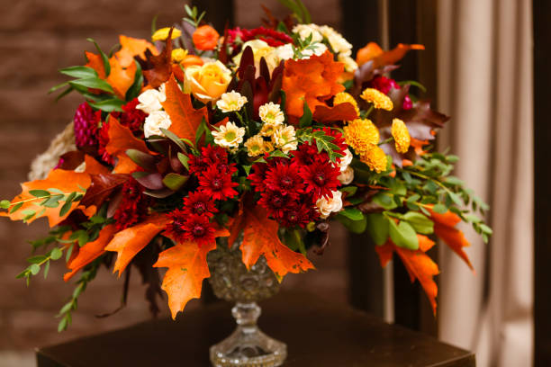 istock pumpkin and autumn bouquet 1016769036