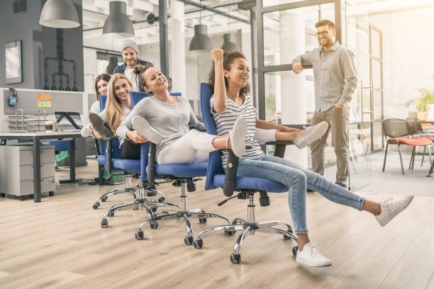 istock Young people having fun in the office. Happy team. 1016772470