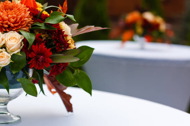 istock autumnal flowers and berries in a vase 1016777190