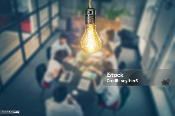 Young Creative Business People Meeting At Office Stock Photo - Download Image Now - Teamwork, Marketing, Business