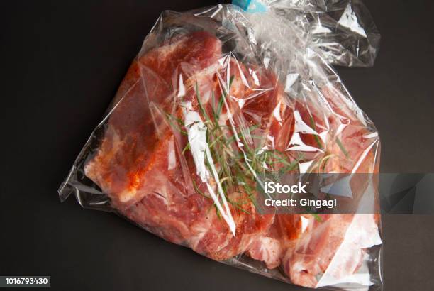 Cooking Baking Plastic Bag No Pastic Concept Fresh Pork Meat Steake Packaged In A Sleeve With Spices For Baking Is Ready For Baking Isolated On Black Background Top View Stock Photo - Download Image Now