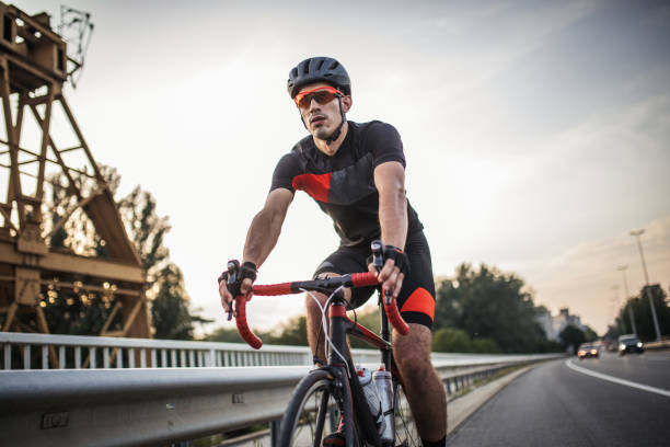 istock Sports man riding racing bicycle 1016793740