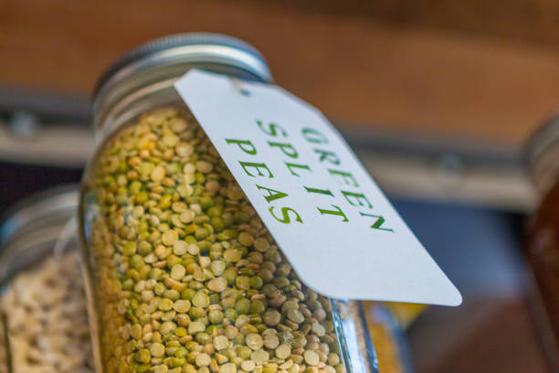 istock Glass Jar of Dried Green Split Peas (French Puy Lentils) with a Tag 1016796122