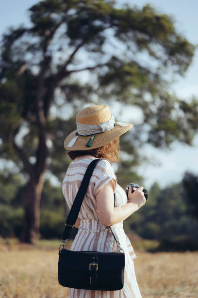 istock Young woman taking a picture 1016800834