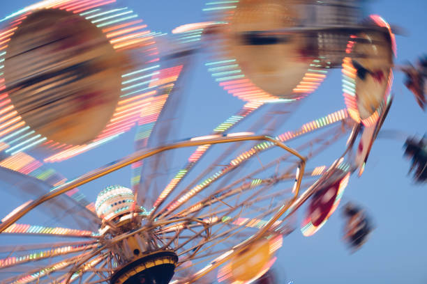 The colorful light trail in the fun fair theme park