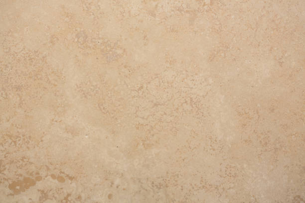 Travertine texture in new beige tone. macro photo
