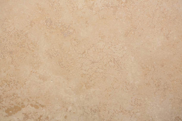 Travertine texture in new beige tone. macro photo Travertine texture in new beige tone. High resolution photo. travertine pool photos stock pictures, royalty-free photos & images
