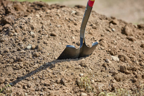 istock Shovel stuck  in a Dirt Pile 1016831524