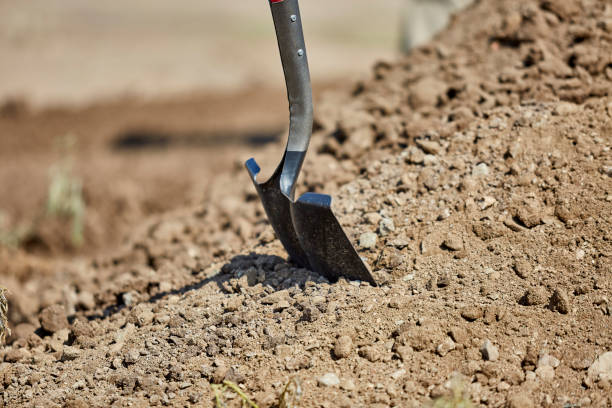istock Shovel stuck  in a Dirt Pile 1016831592