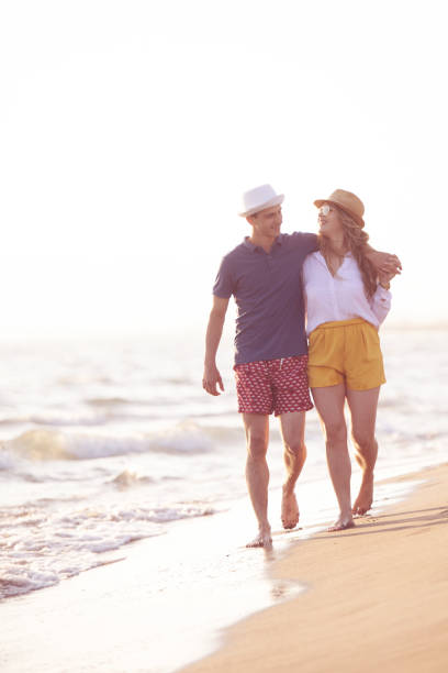 istock Beach of summer time and two lovers 1016843078