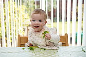 Baby Eating Broccoli